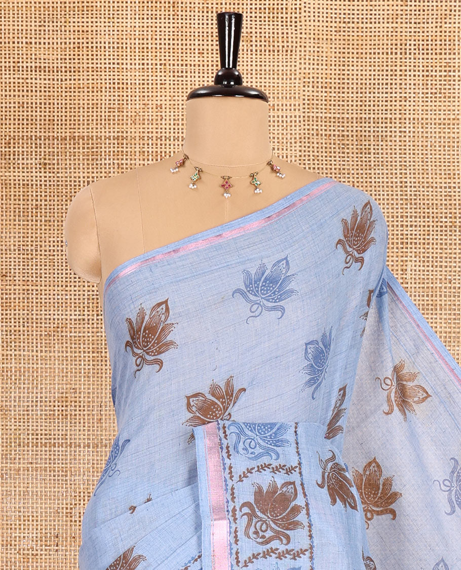 Blue lotus printed soft cotton saree, piping border, printed pallu, and a shibori printed blouse of polka dots