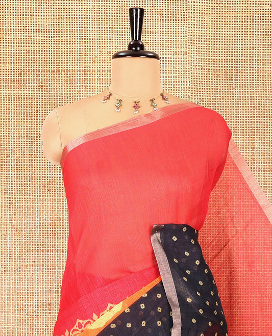 Rani pink batik and bandhani motifs printed linen cotton saree, zari piping border, and a contrast bandhani printed blouse