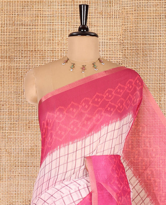 Rani checked linen cotton saree, contrast pochampally style geometric printed border, pochampally printed pallu, and a diamond patterns printed blouse
