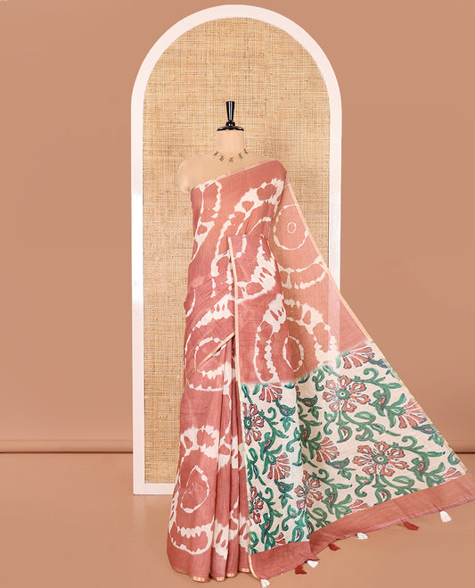 Borderless Brown Linen Cotton Saree Delicately Printed with Shibori Patterns, Complemented by Contrast Pallu Steeped with Floral Vine Print, and Paired with a Contrast Floral Printed Blouse