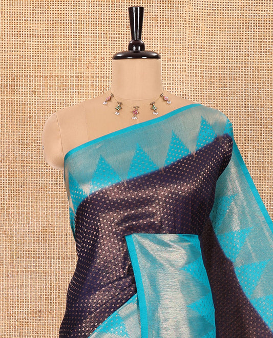Navy Blue Luxury Soft Silk Saree Accentuated with 1000 Zari Buttas All Over Its Body, Complemented by a Contrast Temple Zari Border, Grandly Woven Pallu of Jaal Designs, and Paired with a Contrast Jacquard Blouse