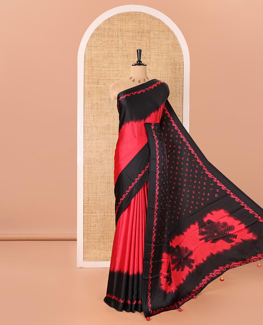 Black and Red Satin Crepe Saree Elevated with Shibori Prints, Complemented by Contrast Shibori Printed Border, Pallu Decked Up with Shibori Prints, and Paired with a Plain Blouse