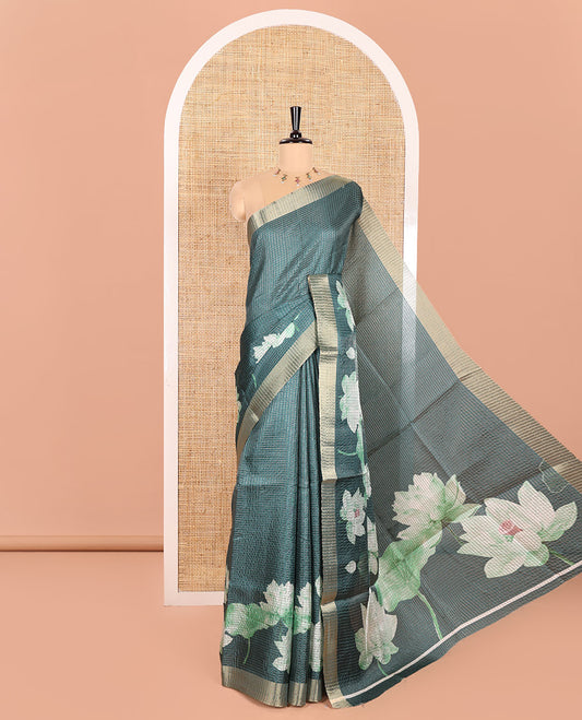 Green Semi Tussar Featuring Micro-Checks and Elegant Lotus Prints All Over Its Body, a Subtle Border, Pallu Mirrors Lotus Motifs, and Comes with a Matching Blouse