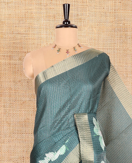 Green Semi Tussar Featuring Micro-Checks and Elegant Lotus Prints All Over Its Body, a Subtle Border, Pallu Mirrors Lotus Motifs, and Comes with a Matching Blouse