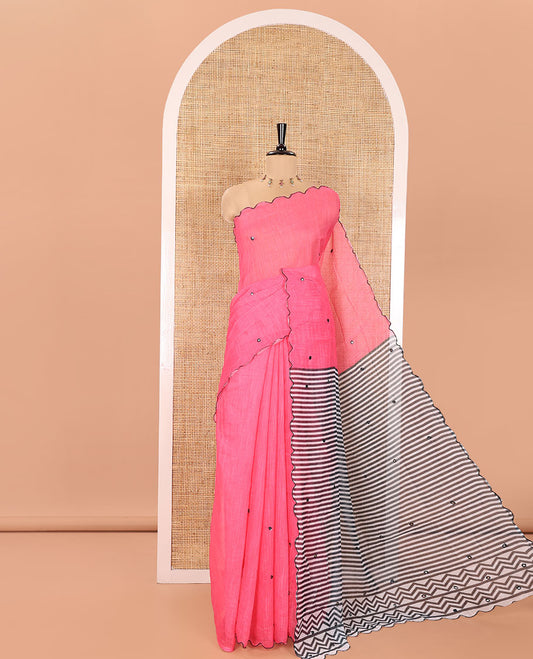 Pink Linen Cotton Saree, Bedecked with Mirror Work All Over Its Body, Subtly Scallop Border, Complemented by Contrast Pallu of Stripes and Mirror Work, and Paired with a Contrast Geometric Printed Blouse