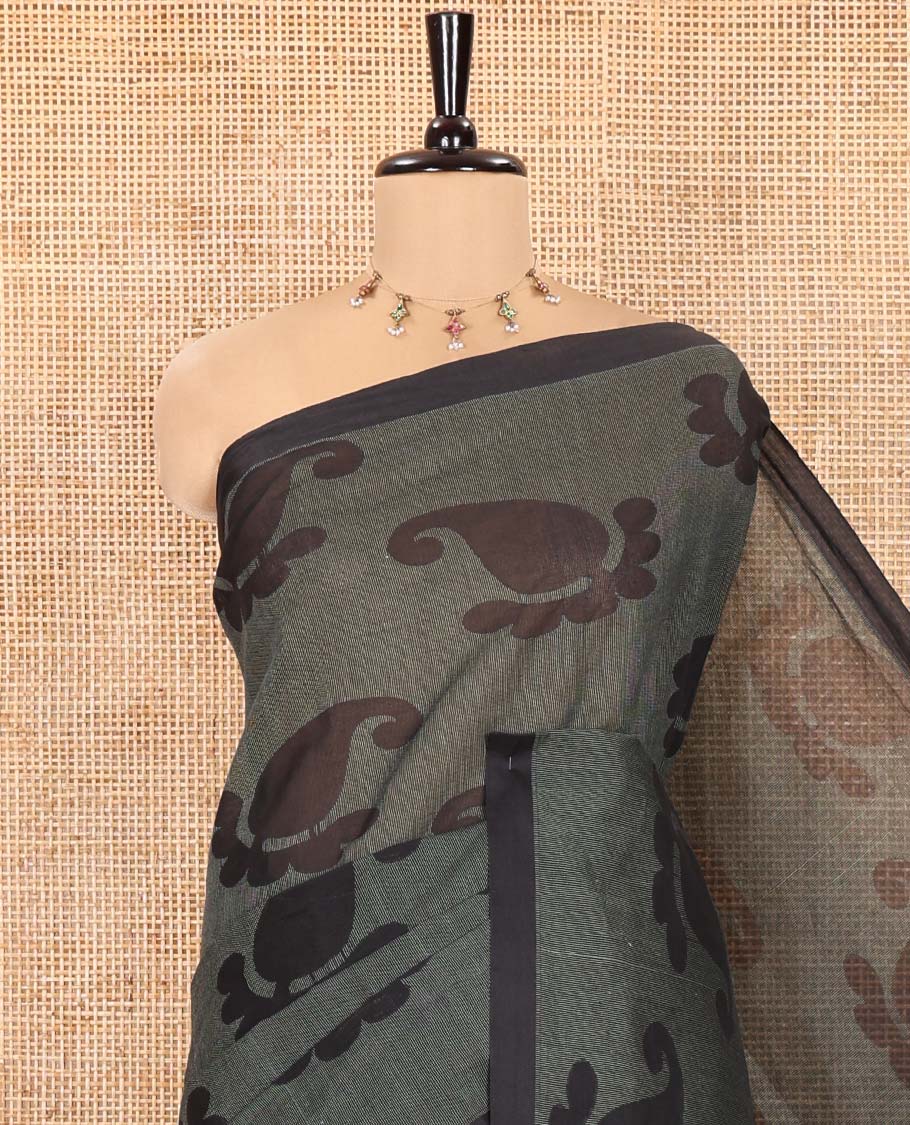 Borderless Black-Green Coimbatore Cotton Saree, Adorned with Paisley Motifs Printed on Its Body, Pallu Intricately Printed with Geometric Motifs, and Paired with a Matching Blouse