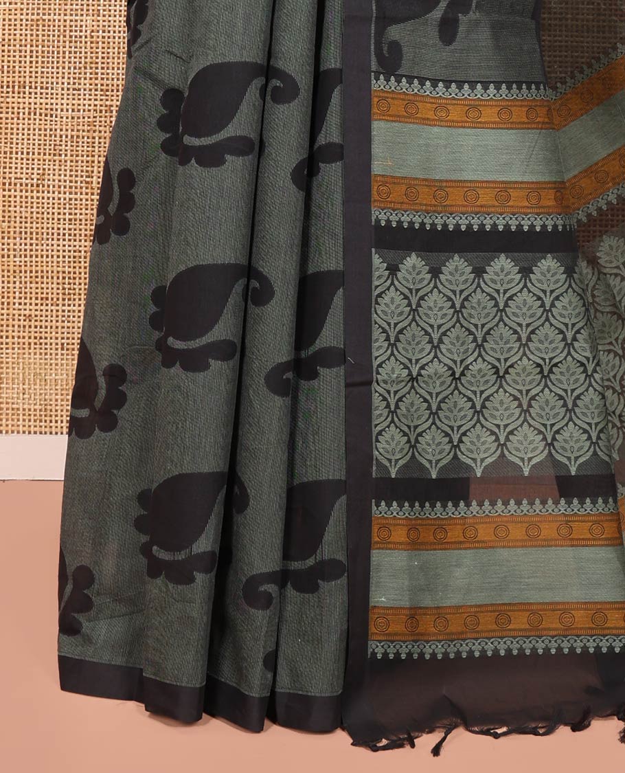 Borderless Black-Green Coimbatore Cotton Saree, Adorned with Paisley Motifs Printed on Its Body, Pallu Intricately Printed with Geometric Motifs, and Paired with a Matching Blouse