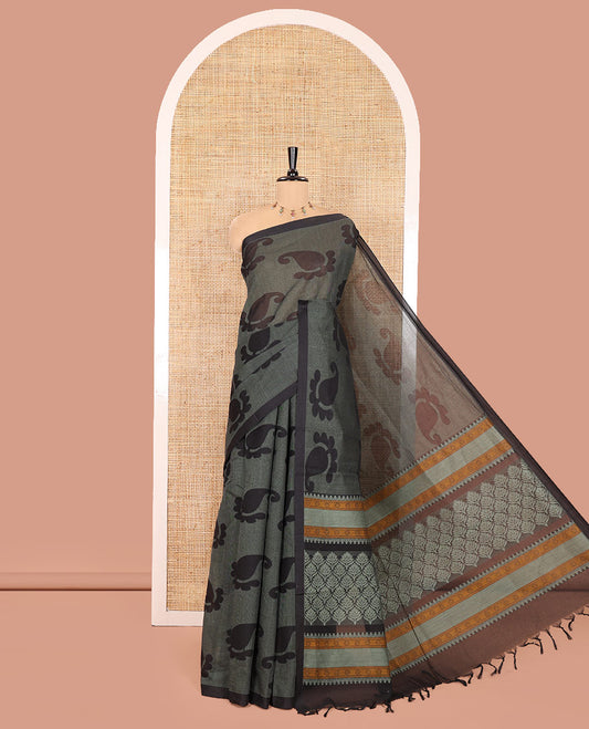 Borderless Black-Green Coimbatore Cotton Saree, Adorned with Paisley Motifs Printed on Its Body, Pallu Intricately Printed with Geometric Motifs, and Paired with a Matching Blouse