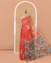 Orange Linen Saree, Adorned with Abstract-Style Print on Its Body, Subtle Piping Border, Captivating Pallu of Floral Vine Print, and Paired with a Contrast Floral Printed Blouse