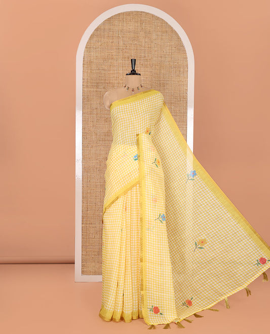 Yellow Linen Cotton Saree, Beautiful Decked Up with Checks and Floral Motifs Printed All Over Its Body, Subtle Piping Border, Pallu Mirrors the Same Design, and Paired with a Printed Blouse