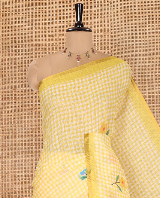 Yellow Linen Cotton Saree, Beautiful Decked Up with Checks and Floral Motifs Printed All Over Its Body, Subtle Piping Border, Pallu Mirrors the Same Design, and Paired with a Printed Blouse