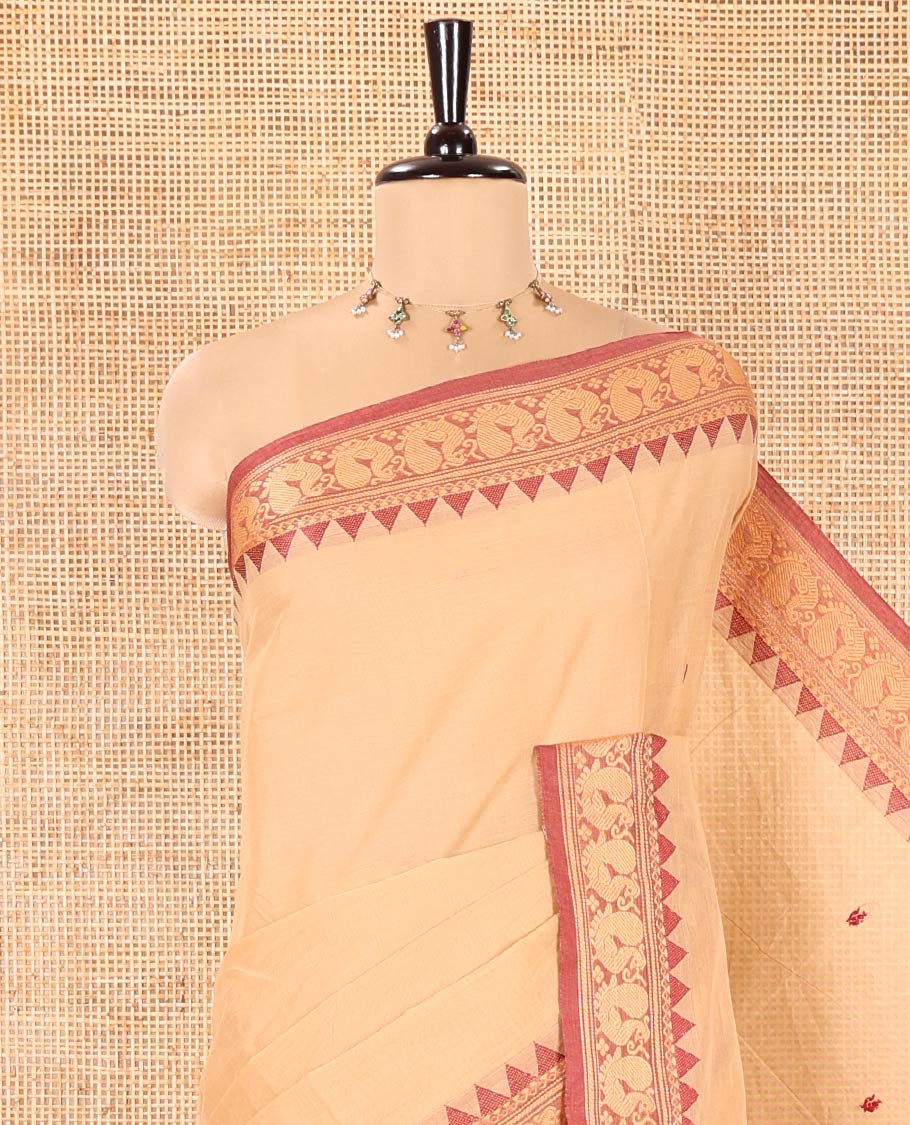 Chikku Chettinad Cotton Saree, Delicately Woven with Thread Buttas All Over Its Body, Complemented by a Contrast Temple Border of Peacock Designs, Pallu of Buttas and Stripes, and Paired with a Matching Blouse