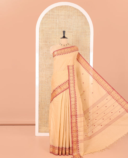 Chikku Chettinad Cotton Saree, Delicately Woven with Thread Buttas All Over Its Body, Complemented by a Contrast Temple Border of Peacock Designs, Pallu of Buttas and Stripes, and Paired with a Matching Blouse