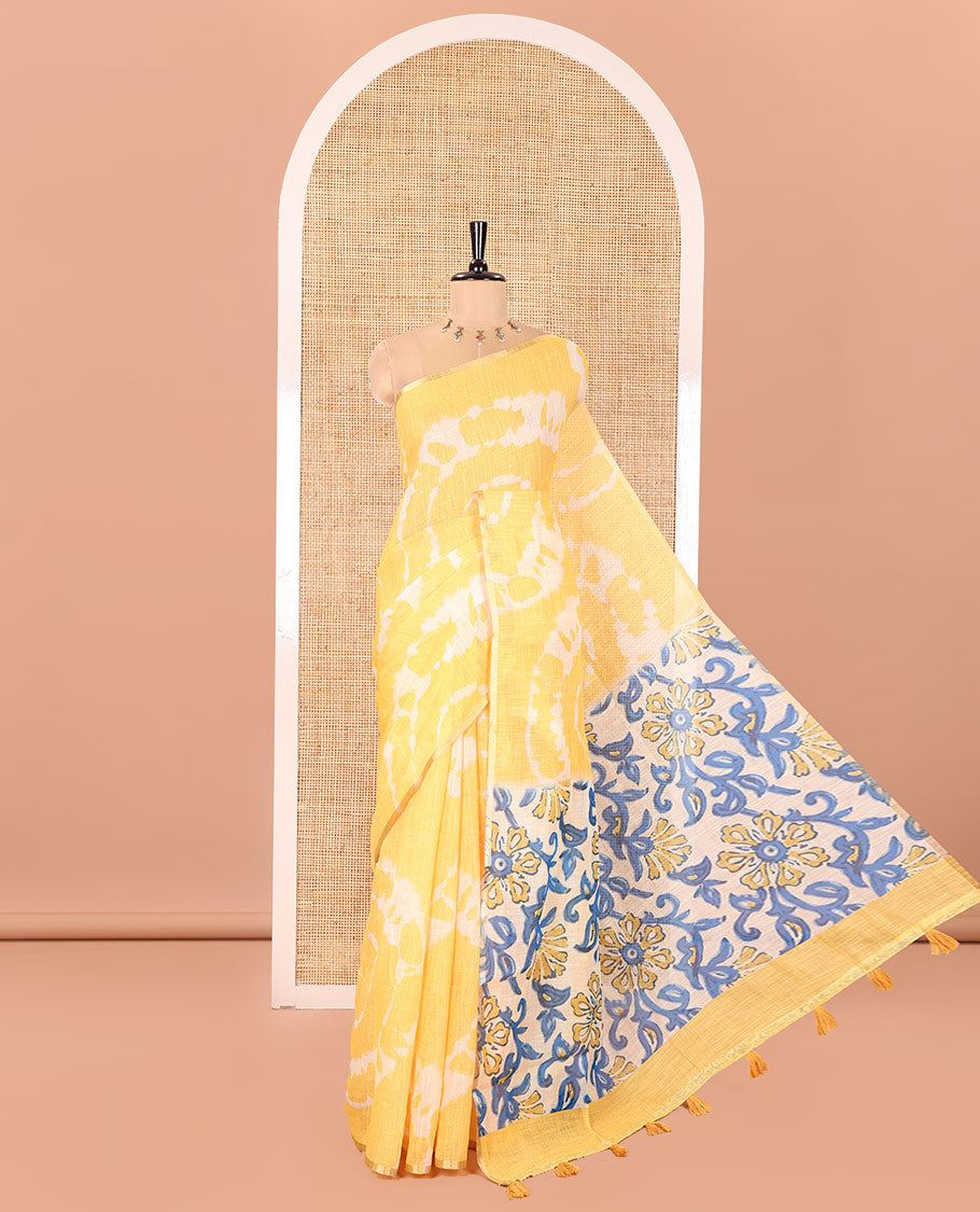 Borderless Yellow Linen Cotton Saree, Decked Up with Shibori Printed on Its Body, Complemented by Contrast Floral Printed Pallu, and Paired with a Contrast Floral Printed Blouse