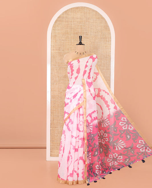 White-Pink Linen Cotton Saree, Bedecked with Shibori-Printed Body, Highlighted by Piping Border, Floral Printed Pallu, and a Contrast Blouse