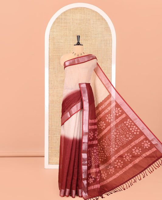 Chikku and Maroon Linen Cotton Saree, Subtly Designed with Half-And-Half-Style Dual-Color Dye on Its Body, Complemented by a Contrast Bavanji Border, Pallu of Batik Print, and Paired with a Contrast Blouse