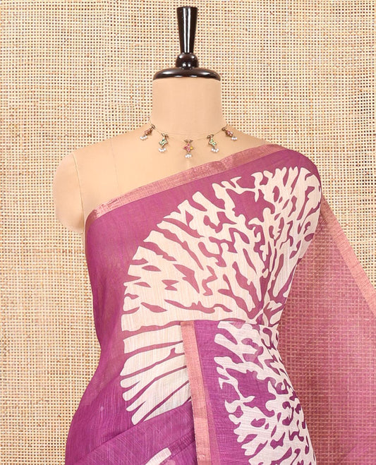 Magenta Linen Cotton Saree, Finely Crafted with Floral Motifs Printed on Its Body, Subtle Piping Border, Complemented by a Contrast Floral Printed Blouse, and Paired with a Contrast Blouse