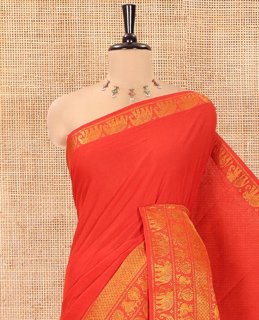 Red Plain Sungudi Cotton Saree, Highlighted by Traditional Zari Border of Peacock and Elephant Motifs Weave, Subtly Striped Pallu, and Paired with a Contrast Veldhari Design Blouse
