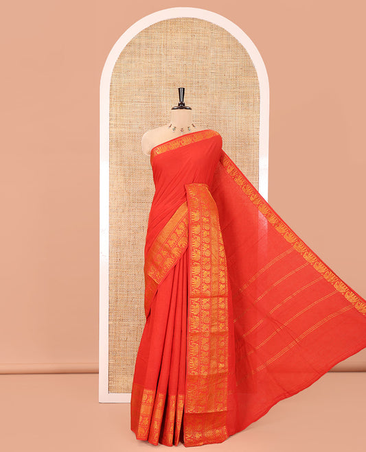Red Plain Sungudi Cotton Saree, Highlighted by Traditional Zari Border of Peacock and Elephant Motifs Weave, Subtly Striped Pallu, and Paired with a Contrast Veldhari Design Blouse