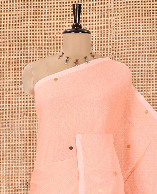 Borderless Orange Mul Cotton Saree, Subtly Sparkled With Big Sequins Work On Its Body, a Self-Pallu and Paired with a Matching Blouse