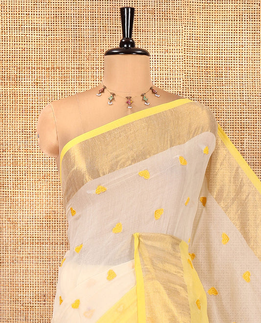 Cream and Yellow Khadi Mul Cotton Saree, Adorned with Half-And-Half-Style and Heart Motifs Embroidery on Its Body, a Subtle Gold Zari Border, a Self-Pallu, and Has No Blouse