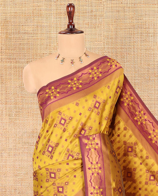 Mustard Elite Soft Silk Saree, Adorned with Pochampally-Style Ikat Thread Weave, Contrast Chakra Border, Floral Pallu, and a Contrast Blouse