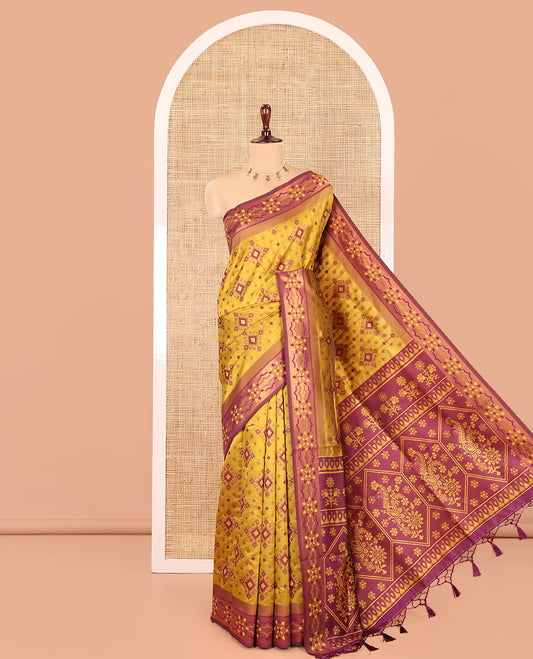 Mustard Elite Soft Silk Saree, Adorned with Pochampally-Style Ikat Thread Weave, Contrast Chakra Border, Floral Pallu, and a Contrast Blouse