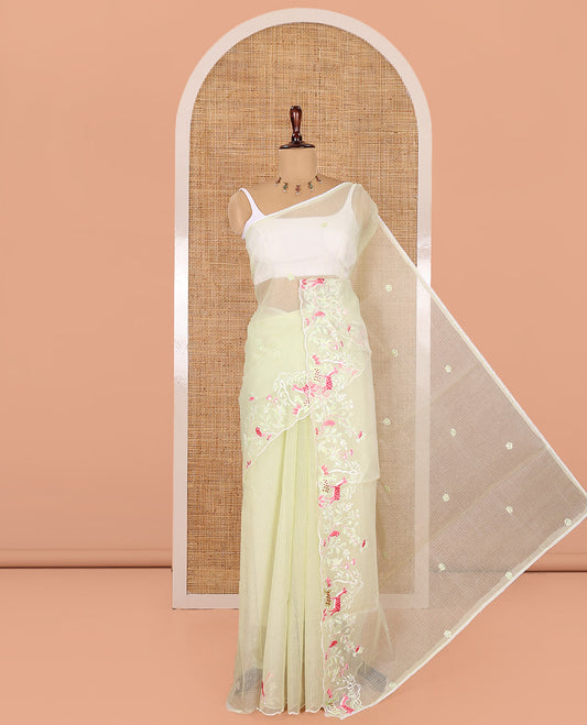 Pista Green Kota Doria Saree, Delicately Woven with Floral and Deer Embroidery, a Scallop Border, and a Contrast Deer Embroidery Blouse