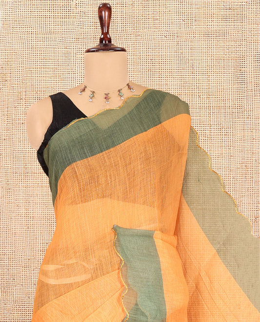 Yellow Plain Linen Cotton Saree, Contrast Plain Scallop Border, a Self-Pallu, and Contrast Kalamkari Printed Blouse