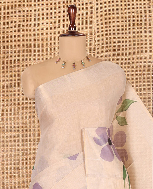Borderless Cream-Lavender Tissue Saree Features Floral Print, a Floral Printed Pallu, and a Contrast Blouse