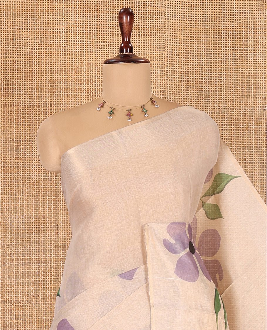 Borderless Cream-Blue Tissue Saree Features Floral Print, a Floral Printed Pallu, and a Contrast Blouse
