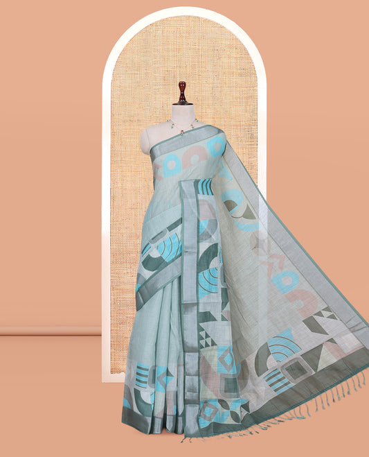 Pista Green Plain Linen Cotton Saree, Complemented by Geometric Printed Zari Border, and a Matching Blouse