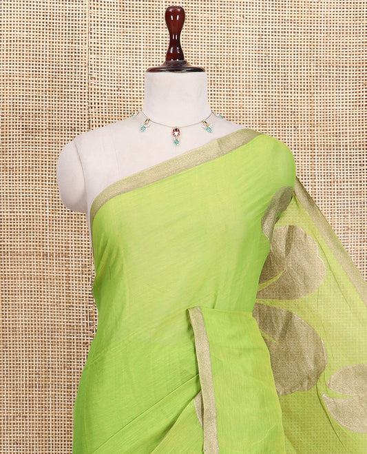 Parrot Green Khadi Mul Cotton Saree Features Floral Motifs Glitter-Print, a Piping Border, and a Matching Blouse