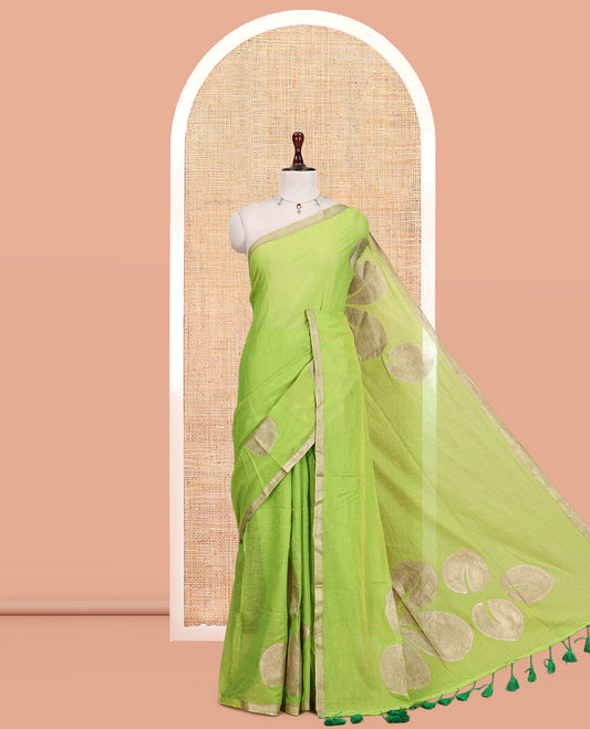 Parrot Green Khadi Mul Cotton Saree Features Floral Motifs Glitter-Print, a Piping Border, and a Matching Blouse