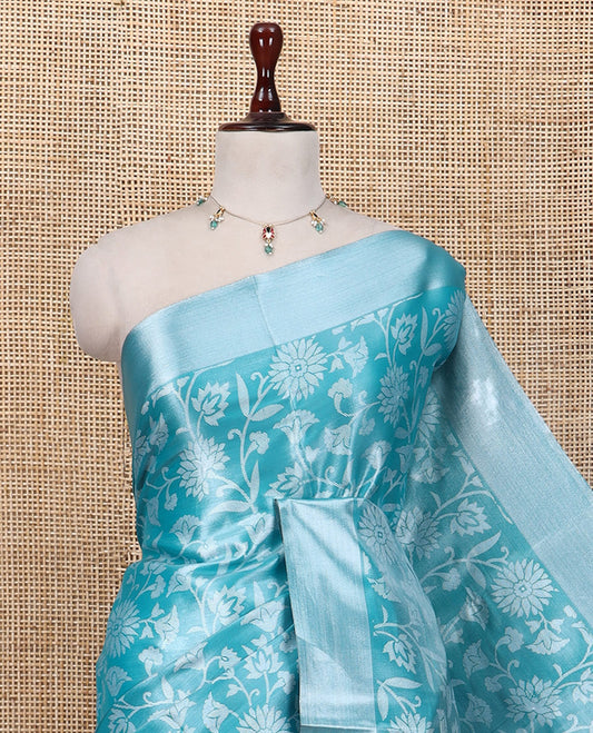 Blue Tissue Cotton Saree Features Floral Vine Design, a Zari Border, Contrast Intricate Pallu, and a Contrast Blouse