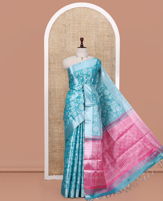 Blue Tissue Cotton Saree Features Floral Vine Design, a Zari Border, Contrast Intricate Pallu, and a Contrast Blouse