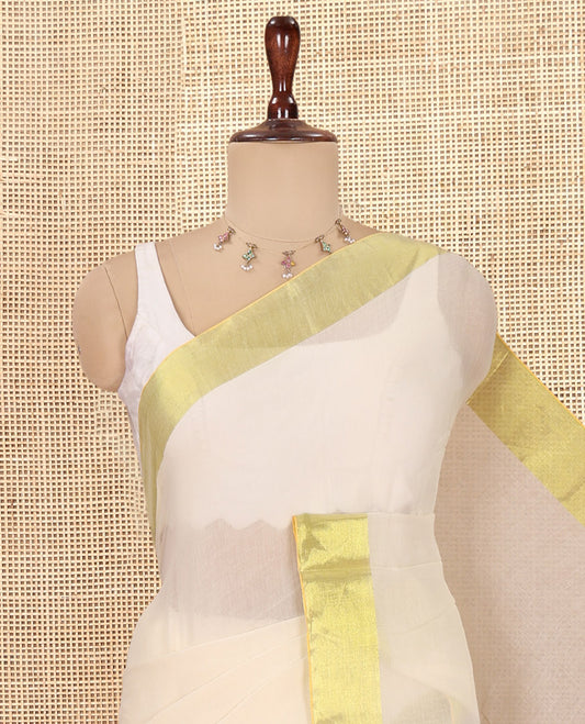 Cream Plain Khadi Mul Cotton Saree, a Gleaming Gold Zari Border, a Self-Pallu, and No Blouse