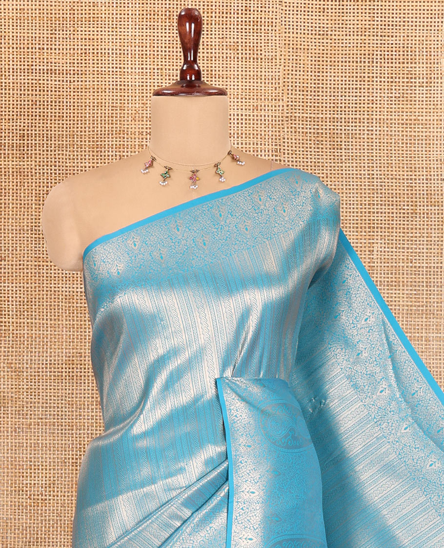 Peacock Elite Soft Silk Saree Features Jacquard Design, a Zari Border, Paisley Pallu, Matching Blouse