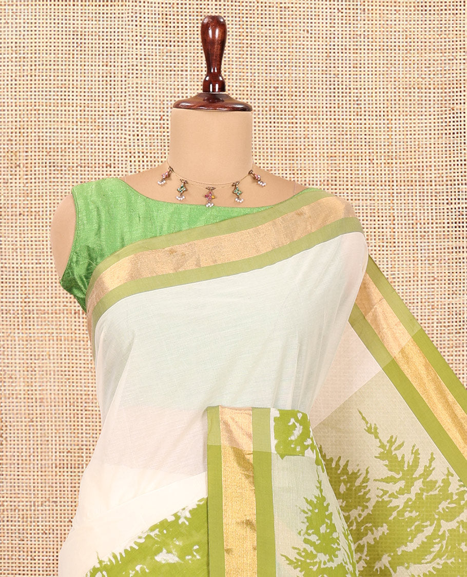 Cream-Olive Green Kerala Cotton Saree Features Tree Print, Contrast Border, and a Contrast Blouse