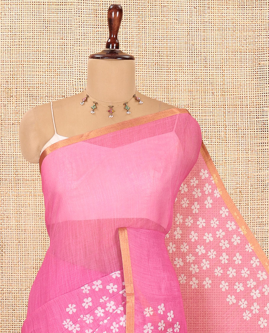 Pink Linen Cotton Saree Features Half-And-Half-Style Flower Motifs Print, a Piping Border, and a Matching Blouse