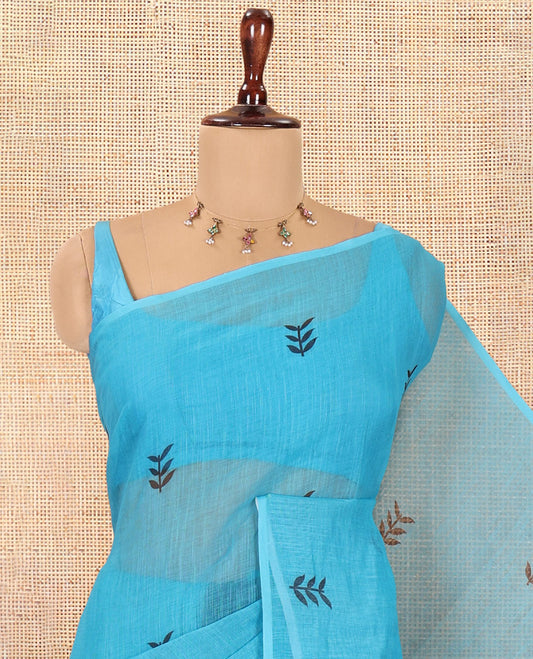 Borderless Blue Linen Cotton Saree with Leaf Print, a Contrast Leaf-Printed Pallu, and Contrast Blouse