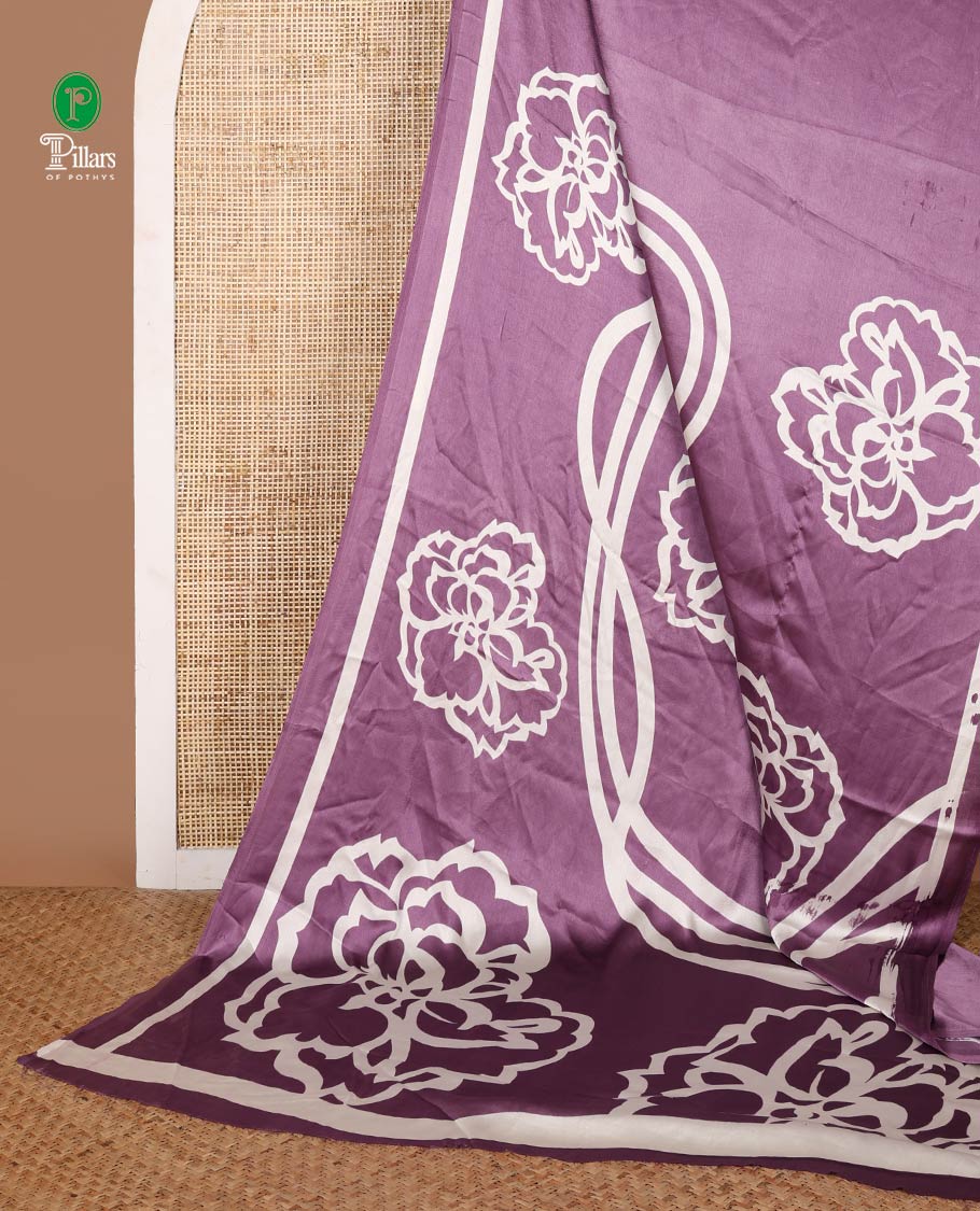 Bordeless white with lavender printed design modal crepe saree & printed pallu along with plain blouse