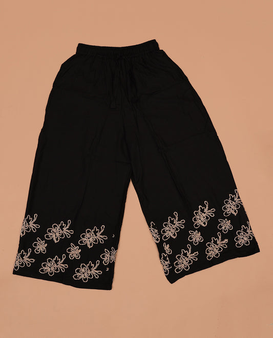 Black floral motifs thread coding embroidered rayon palazzo pants