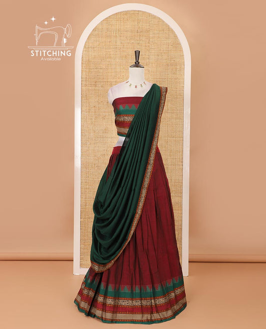 Maroon mercedised cotton half-saree, contrast traditional resham thread border skirt, matching blouse & contrast green thread border georgette dhavani