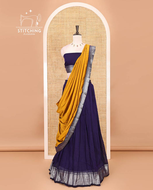 Royal blue Mercerised cotton half-saree, plain & contrast mayil kann temple border skirt, matching blouse & contrast zari border syska georgette dhavani