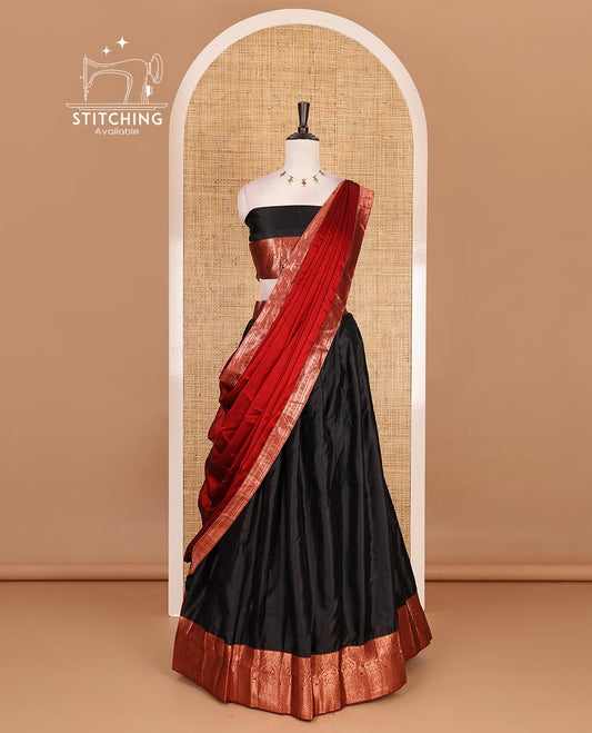 Black taffeta silk half saree, zari buttas with contrast red traditional zari border skirt, matching zari design blouse, and contrast plain zari border syska georgette dhavani