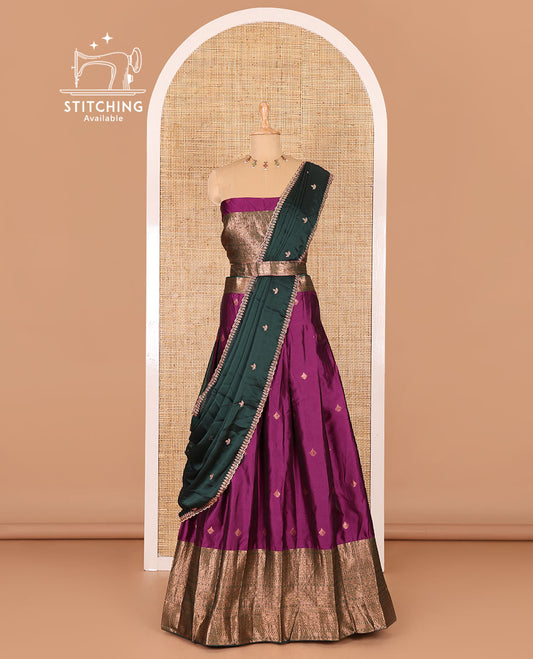 Violet taffeta silk half-saree, zari buttas and contrast traditional zari bordered skirt, a matching blouse, and contrast embroidered satin georgette  dhavani