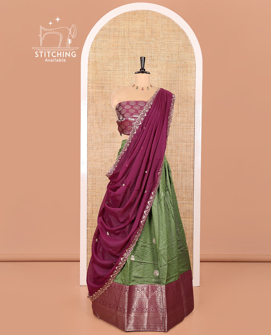 Mehendi Green and Purple Banarasi Silk Half-Saree Featuring Micro-Checks and Chakram Buttas Woven Skirt, Complemented by Contrast Traditional Zari Design Border, Paired with a Jacquard Blouse, and a Rangoli Georgette Embroidered Dhavani