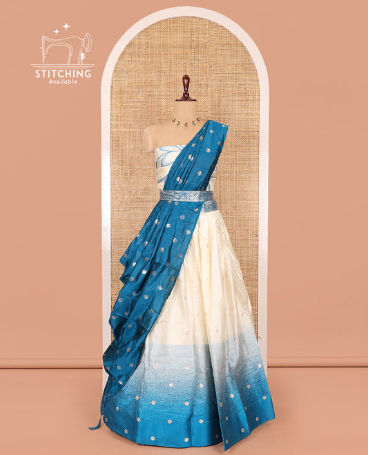 Cream-Rama Semi-Silk Half-Saree Features Flower Buttas Skirt, Contrast Border, Matching Blouse, Contrast Dhavani