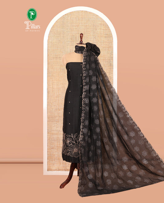 Black Semi-Silk Material Churidar Set, Floral Embroidered Top, a Matching Bottom, and a Scallop Foil Printed Dupatta